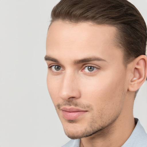 Neutral white young-adult male with short  brown hair and brown eyes