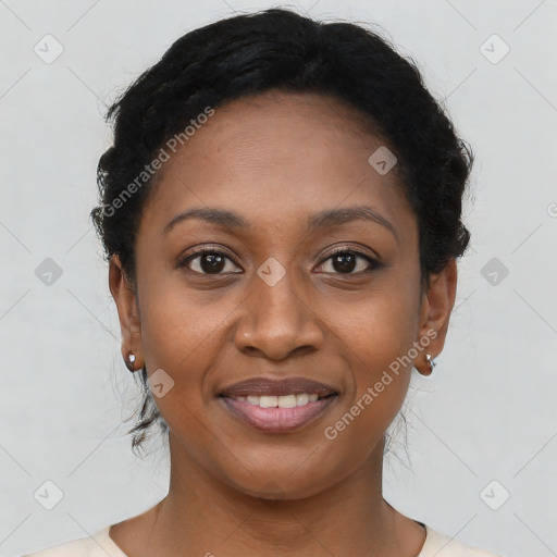 Joyful black young-adult female with short  brown hair and brown eyes