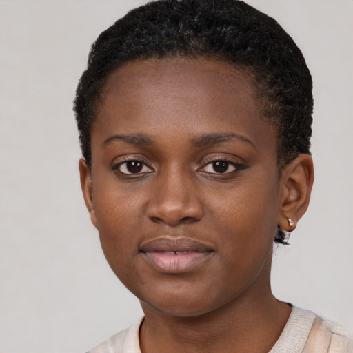 Neutral black young-adult female with short  brown hair and brown eyes