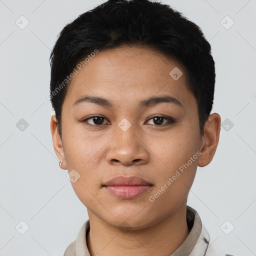 Joyful latino young-adult female with short  black hair and brown eyes