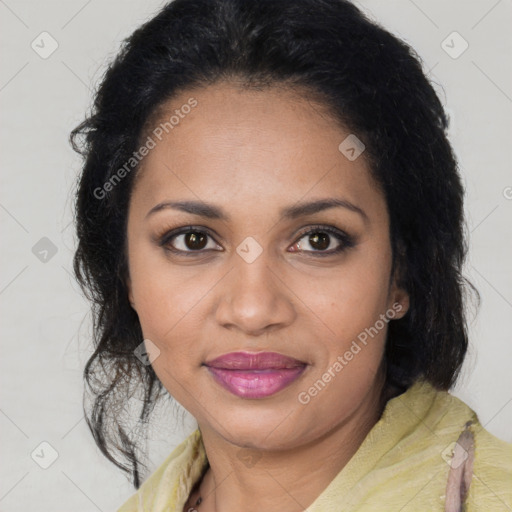 Joyful black young-adult female with medium  brown hair and brown eyes