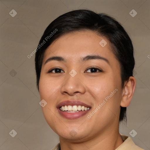 Joyful asian young-adult female with medium  black hair and brown eyes