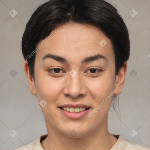 Joyful asian young-adult female with short  brown hair and brown eyes