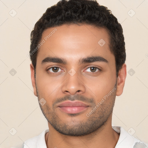 Neutral latino young-adult male with short  black hair and brown eyes