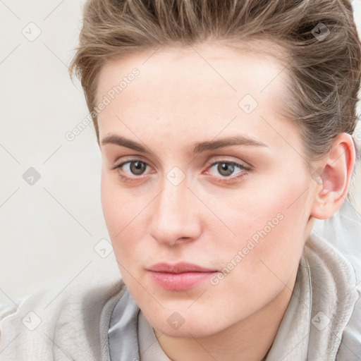 Neutral white young-adult female with medium  brown hair and blue eyes