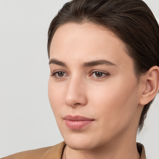 Neutral white young-adult female with medium  brown hair and brown eyes