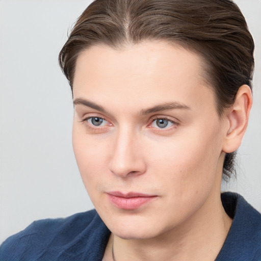 Neutral white young-adult male with medium  brown hair and grey eyes