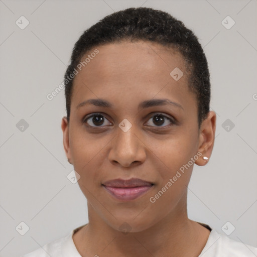 Joyful black young-adult female with short  brown hair and brown eyes