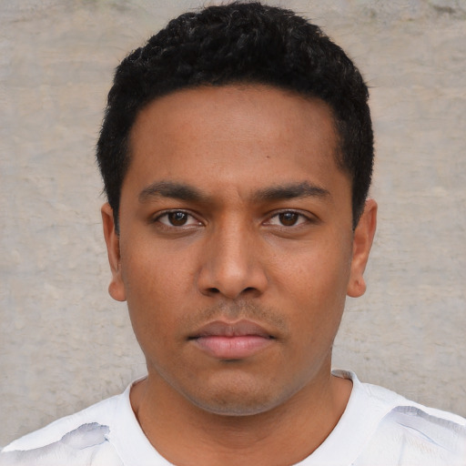 Neutral black young-adult male with short  black hair and brown eyes