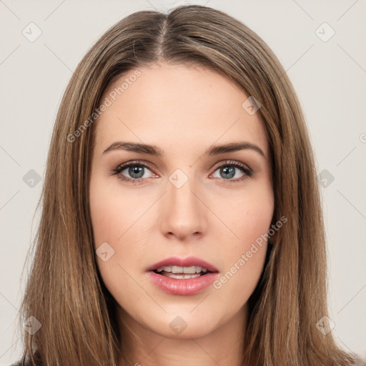 Neutral white young-adult female with long  brown hair and brown eyes