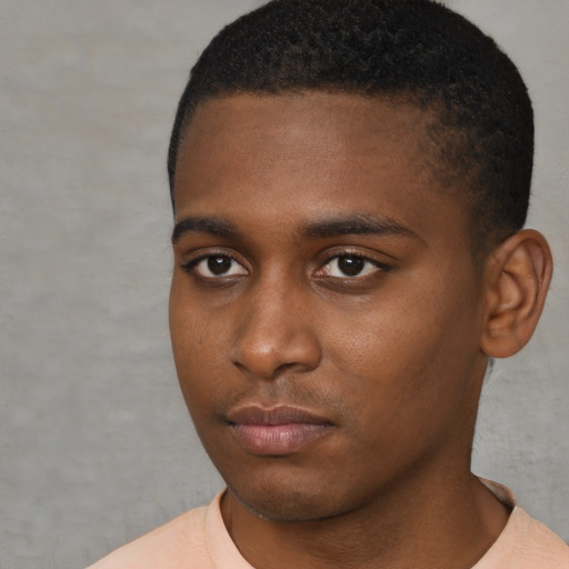 Neutral black young-adult male with short  brown hair and brown eyes