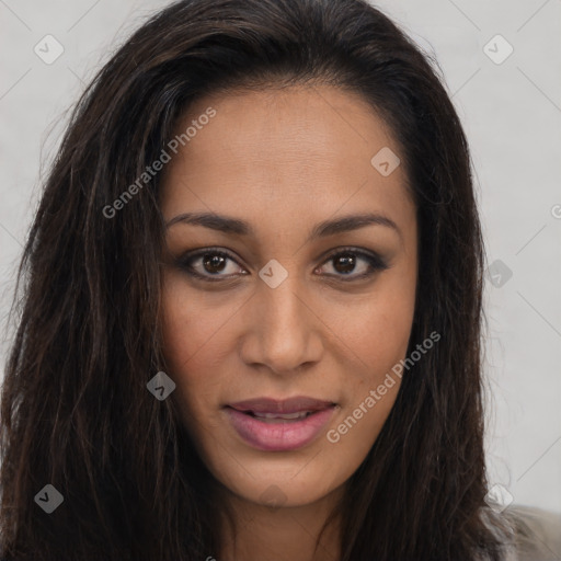 Joyful latino young-adult female with long  brown hair and brown eyes