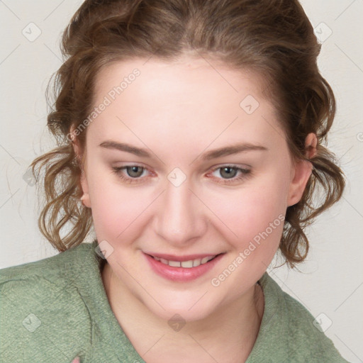 Joyful white young-adult female with medium  brown hair and blue eyes