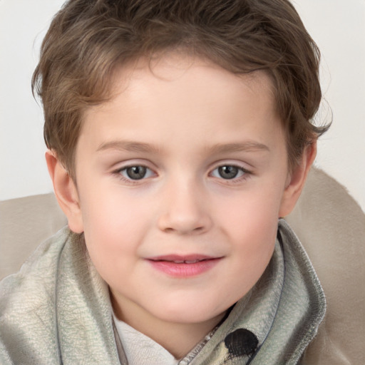 Joyful white child female with short  brown hair and grey eyes