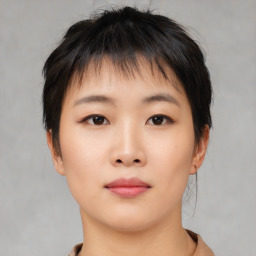 Neutral asian young-adult female with short  brown hair and brown eyes