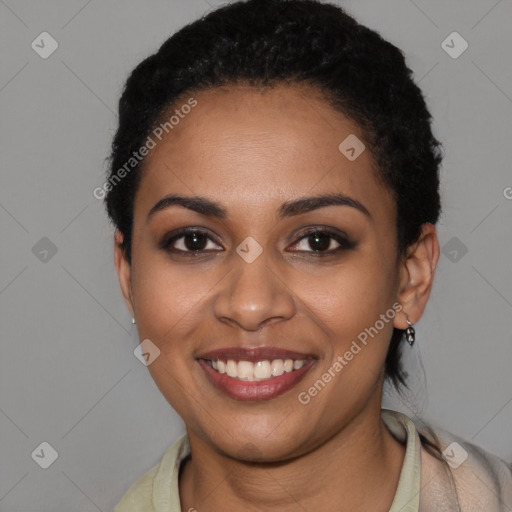 Joyful latino young-adult female with short  black hair and brown eyes