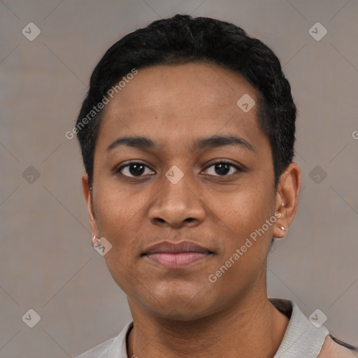 Joyful black young-adult male with short  black hair and brown eyes