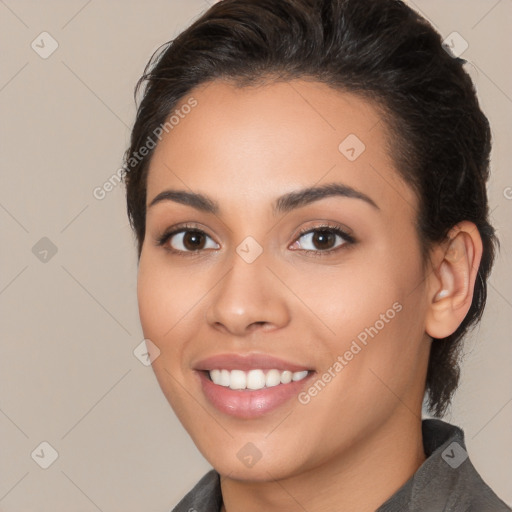 Joyful white young-adult female with long  brown hair and brown eyes