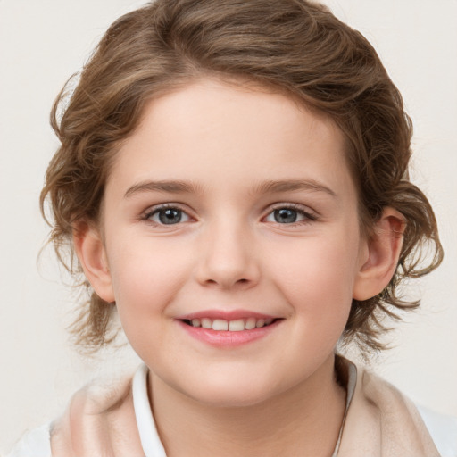 Joyful white child female with medium  brown hair and grey eyes