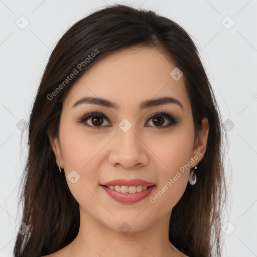 Joyful latino young-adult female with long  brown hair and brown eyes