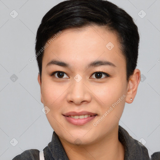 Joyful asian young-adult female with short  black hair and brown eyes