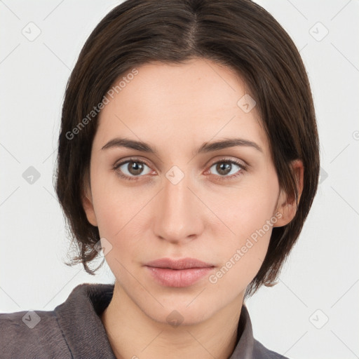 Neutral white young-adult female with medium  brown hair and brown eyes