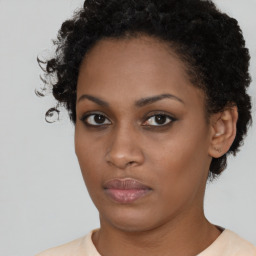 Neutral black young-adult female with short  brown hair and brown eyes