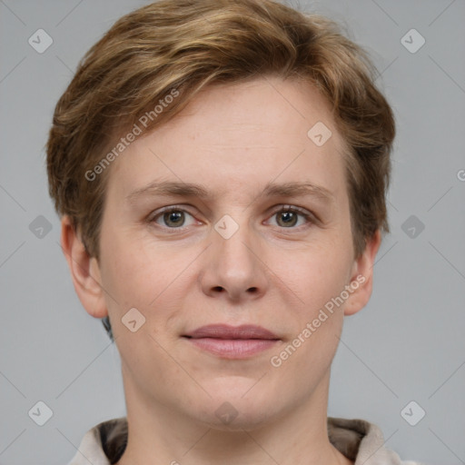 Joyful white young-adult female with short  brown hair and grey eyes