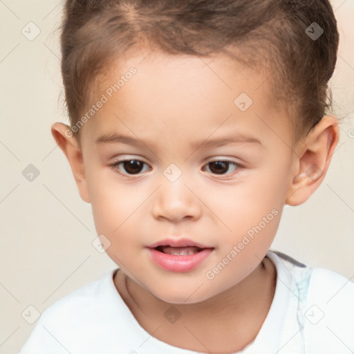 Joyful white child male with short  brown hair and brown eyes