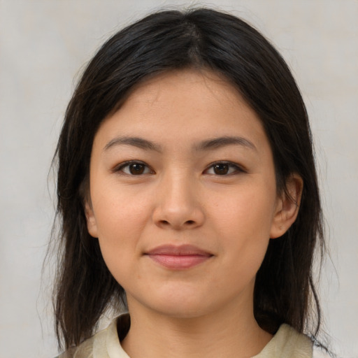 Neutral latino young-adult female with medium  brown hair and brown eyes