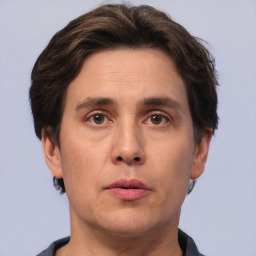 Neutral white adult male with short  brown hair and brown eyes