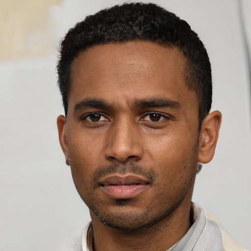 Neutral black young-adult male with short  black hair and brown eyes