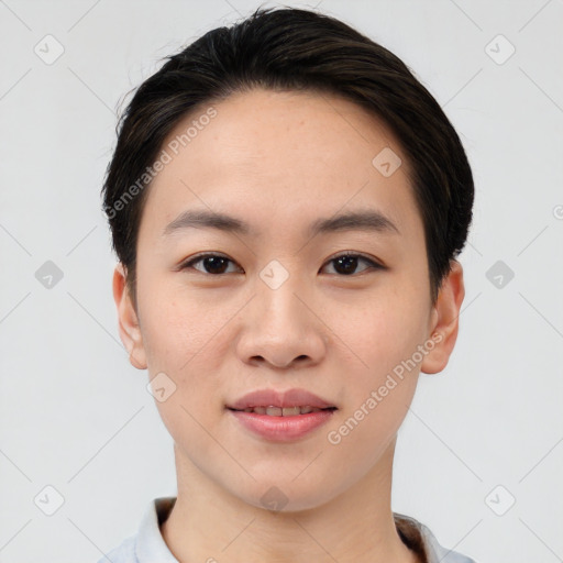 Joyful asian young-adult female with short  brown hair and brown eyes