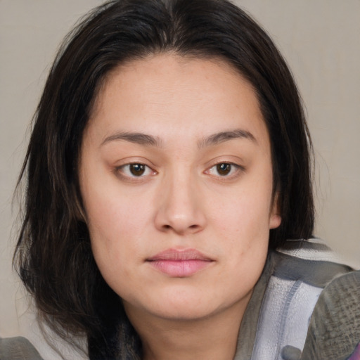 Neutral asian young-adult female with medium  brown hair and brown eyes