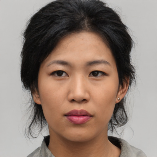 Neutral asian young-adult female with medium  black hair and brown eyes