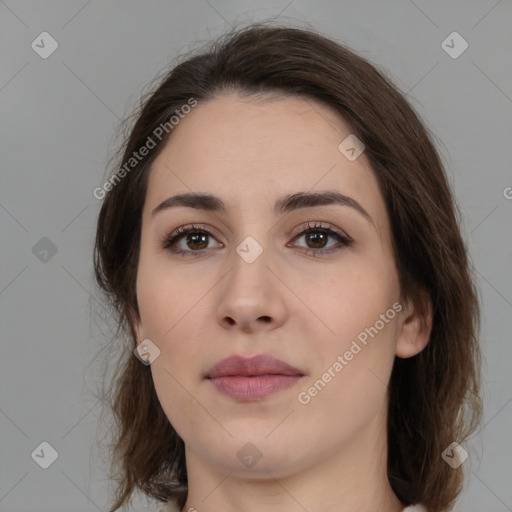 Neutral white young-adult female with medium  brown hair and brown eyes