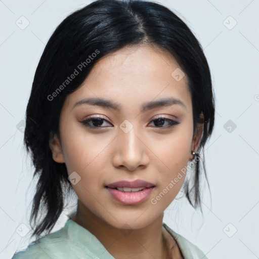 Joyful asian young-adult female with medium  black hair and brown eyes