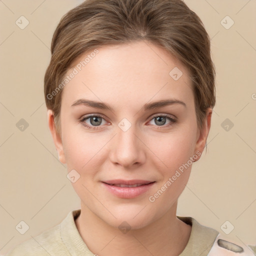 Joyful white young-adult female with short  brown hair and grey eyes