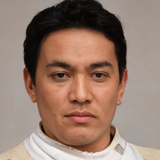 Neutral white young-adult male with short  black hair and brown eyes