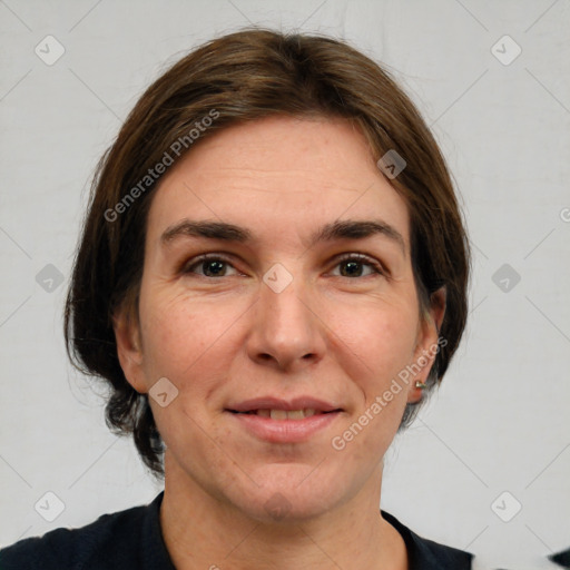 Joyful white adult female with short  brown hair and brown eyes