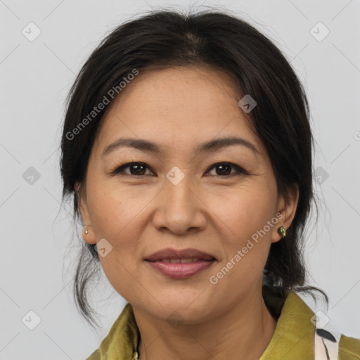 Joyful white adult female with medium  brown hair and brown eyes