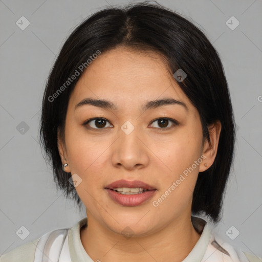 Joyful latino young-adult female with medium  black hair and brown eyes