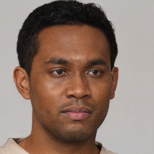 Neutral black young-adult male with short  brown hair and brown eyes