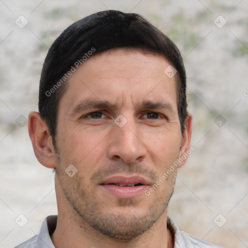 Joyful white adult male with short  brown hair and brown eyes