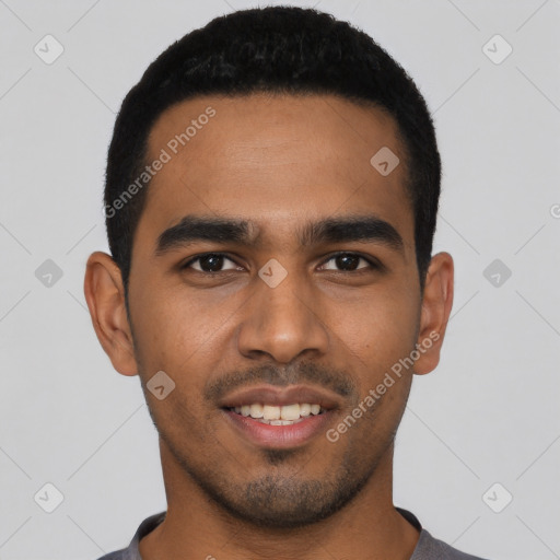 Joyful latino young-adult male with short  black hair and brown eyes