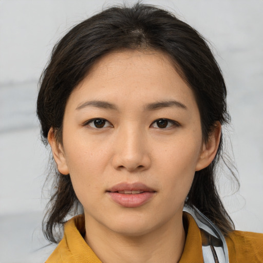 Neutral asian young-adult female with medium  brown hair and brown eyes