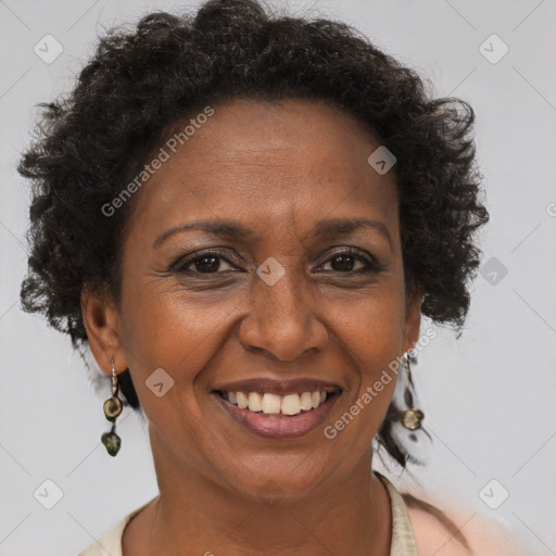 Joyful black adult female with short  brown hair and brown eyes