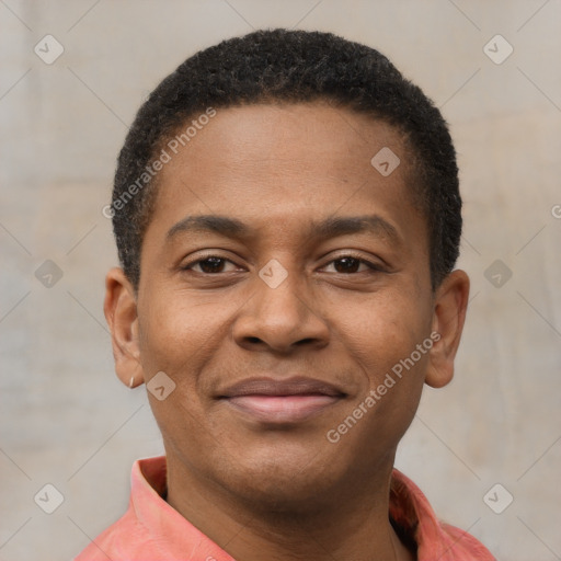 Joyful latino young-adult male with short  brown hair and brown eyes