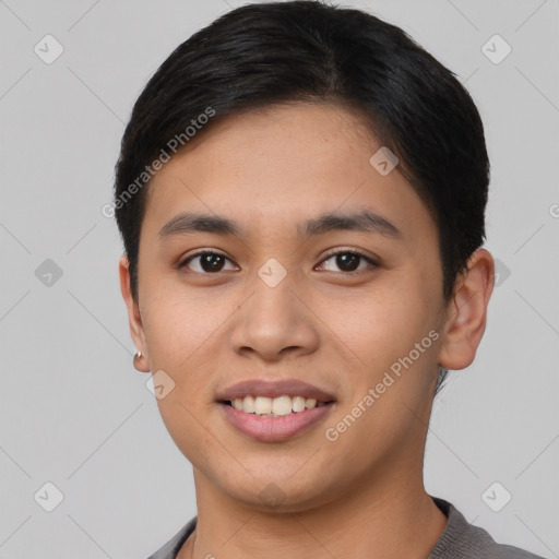 Joyful asian young-adult male with short  black hair and brown eyes