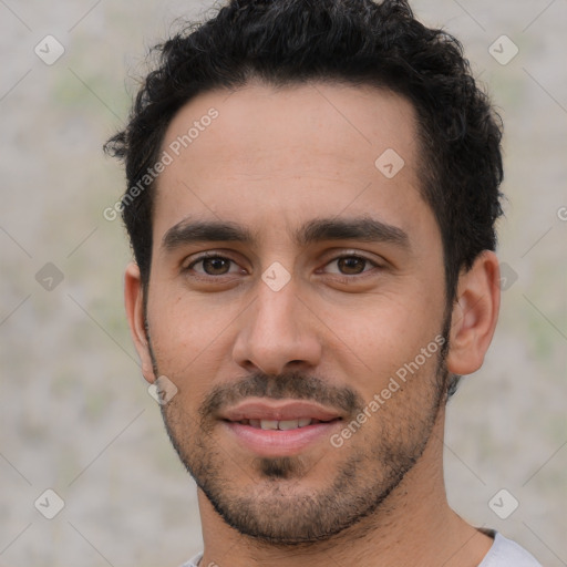 Joyful white young-adult male with short  black hair and brown eyes